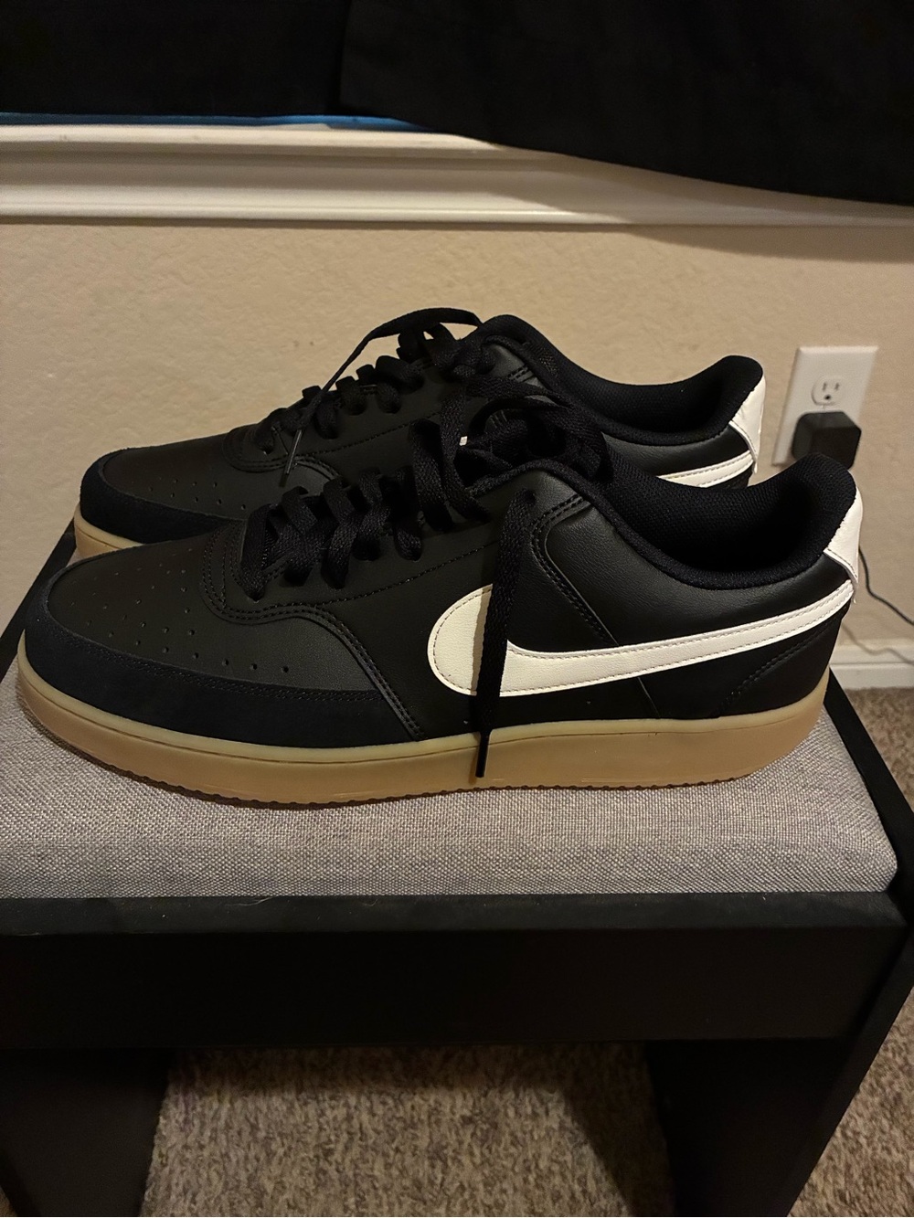 Black Low-Top Sneakers with White Accent and Gum Sole